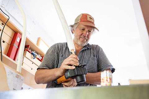 Since he's left politics, Mike O'Brien's taken a hands-on approach to climate change by running his own business installing climate-friendly HVAC systems. (Photo: Alex Garland)