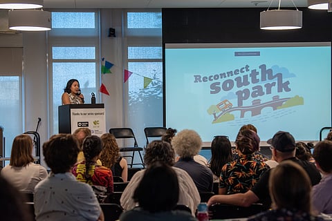 Rosa Lopez, of Reconnect South Park, speaks at the Mobility Justice event at Centilia Cultural Center about the group's long-term effort to unify the community by replacing SR 99 with green space and community gathering areas. (Photo courtesy of Seattle Neighborhood Greenways.)
