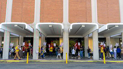 Southcenter Macy's workers and community members gather for a picket. (Photo: Ronnie Estoque)