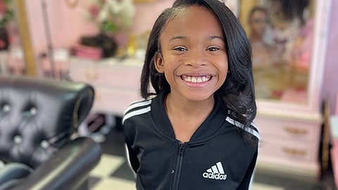 Eight-year-old KJ Hall, who lives with sickle cell anemia, is raising awareness and supporting others living with SCD. (Photo courtesy of KD Hall.)