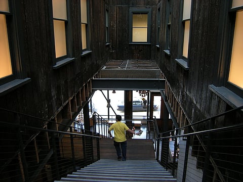 Looking down the main staircase of the Wing Luke Museum, June 22, 2008. Photo is attributed to Joe Mabel (under a Creative Commons, CC BY-SA 3.0 license).