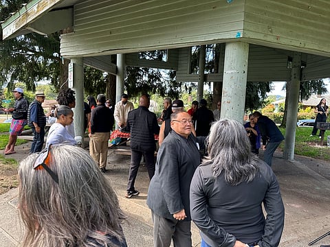 John Yasutake, center, and other community leaders gathered at Benefit Playground in Beacon Hill. (Photo: Phil Manzano)