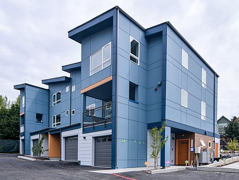 Homestead's Willowcrest Townhomes in Renton are net-zero energy, meaning they produce more energy through solar panels than the buildings use. The development, which is sold out, was priced to be affordable to people who earned 80% of the area's median income. (Photo courtesy of Homestead Community Land Trust.)