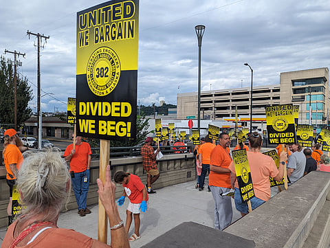 Members of IUOE Local 302 protest for a new contract on South Lander Street Wednesday in front of the John Stanford Center for Educational Excellence, headquarters for Seattle Public Schools. (Photo: Ari Robin McKenna)