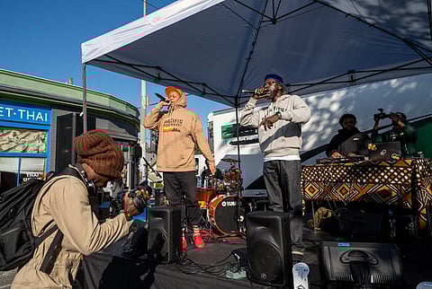 (DJ) Trumendous and Yirim Seck performed on the Hip Hop 50 Music Stage at Fat's Chicken and Waffles on Sept. 30 during the third annual Walk the Block Art Festival and Fundraiser. (Photo: Susan Fried)
