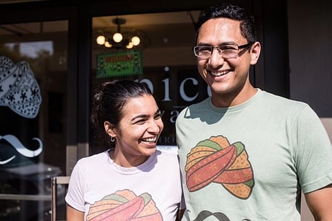 Aakanksha Sinha (left) and Uttam Mukherjee (right) are the co-owners of Spice Waala. The Indian street food restaurant recently opened a spot in Columbia City. (Photo courtesy of Spice Waala.)