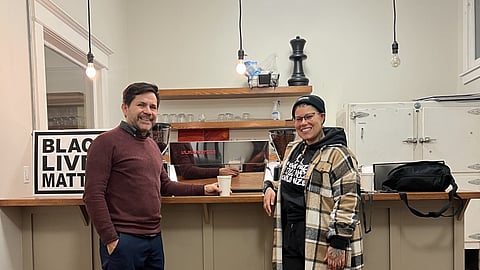 Creative Justice Executive Director Nikkita Oliver (right) and Blas Alfaro (left) of Fulcrum Coffee Roasters inside the new Creative Cafe at Washington Hall. (Photo courtesy of Creative Justice.)