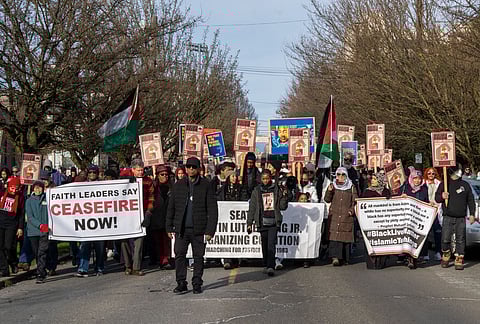 Over a thousand people ignored the cold weather and participated in the 41st annual MLK Jr. March from Garfield High School. (Photo: Susan Fried)