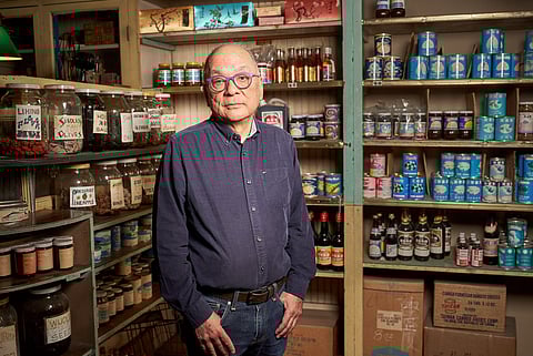 Frank Abe at the Wing Luke Museum's installation of the historic Yick Fung grocery store. (Photo: Kayla Isomura, courtesy of Frank Abe)