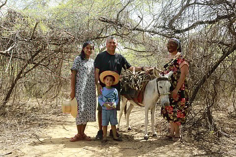 Indigenous Wayuu filmmakers Marbel Vanegas Jusayu and David Hernndez Palmar pause with Dayuma Palmar and Emiliano David Muz during the community-driven production of "Buscando las Marcas del Ashoojushi / Searching for the Marks of the Ashoojushi." (Photo courtesy of the Tatuado con Espinas - Asho'ojushi Collective)