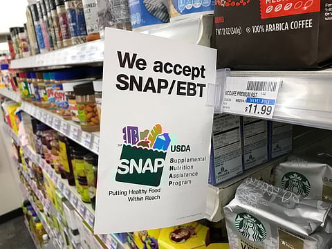 The interior of a retail store in Los Angeles, California, displaying their participation in the SNAP program in 2019. Photo via Jeff Bukowski/Shutterstock.com