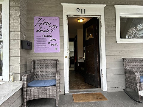 Kathya Alexander's "The Visit" is on view outside Wa Na Wari as part of Seattle Civic Poet Shin Yu Pai's Poetry in Place campaign for National Poetry Month. (Photo: Jas Keimig)