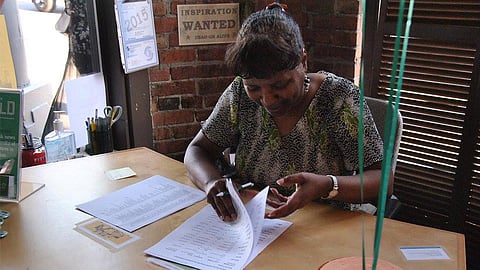 Cynthia Green manages a raffle table at the Emerald's first anniversary party in 2015. (Photo: Hannah Letinich)