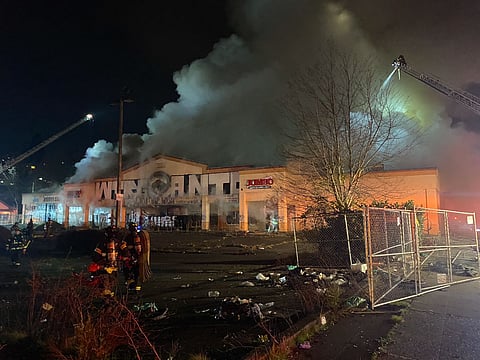 More than 80 firefighters responded to a two-alarm fire on Nov. 28 at the abandoned Jumbo building near Rainier Avenue South and South Genesee Street. (Photo courtesy of Seattle Fire Department)