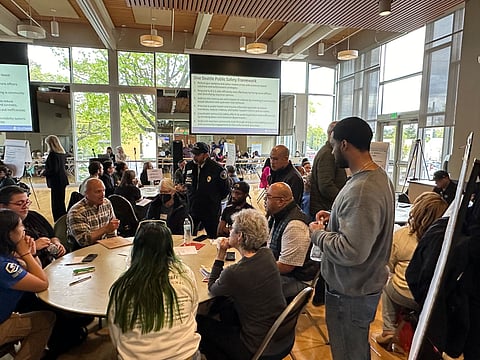 South Seattle residents engage with City officials Tuesday night, May 7, at a public safety forum at Rainier Beach Community Center. Input from the forum will help shape Mayor Bruce Harrell's comprehensive plan for his One Seattle Public Safety Framework. (Photo: Phil Manzano)