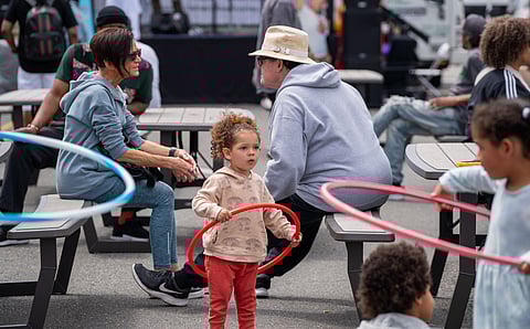 Young hula-hoopers at Honoring Africatown Community Land Trust's Honoring Our Black Wall Streets on May 27., 2024 (Photo by Susan Fried)