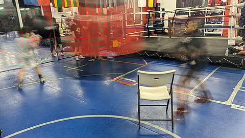 Christian "The Spider" Dobbins (left) and Dre'Vonn "Deuce the Truth" Kelley (right) shadowbox. (Photo: Ari Robin McKenna)