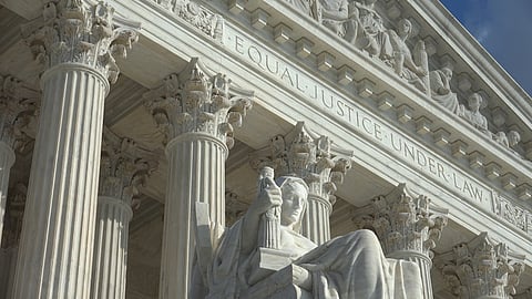 The "Equal Justice Under Law" engraving above the entrance to the Supreme Court Building in Washington, D.C., in 2016. Photo via Bob Korn/Shutterstock.com