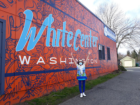 Ana Castro, founder of Salvadorean Bakery, outside the store in 2021 which has become a fixture in White Center in nearly three decades. (Photo courtesy of Salvadorean Bakery)