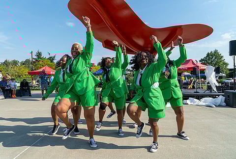 The Throwbacks, an over-50 dance group, perform at the 2024 ROOTS Family Celebration on Sept. 1 at Jimi Hendrix Park. (Photo: Susan Fried)
