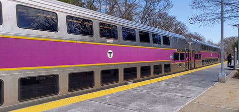 An MBTA commuter train leaves the station.