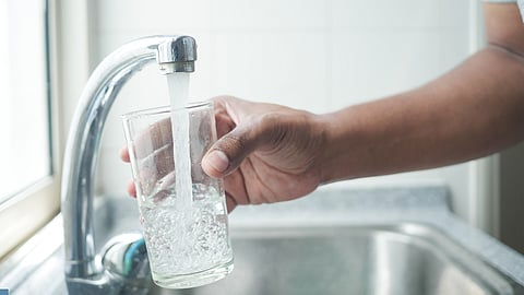Filling water glass at the faucet