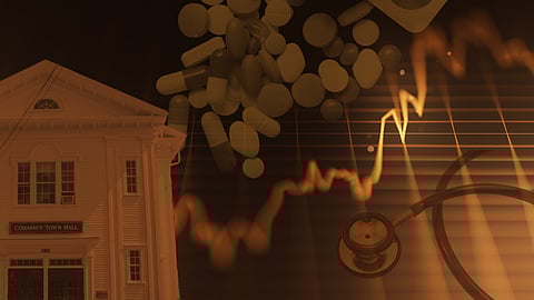 Town hall with a graph showing rising drug prices