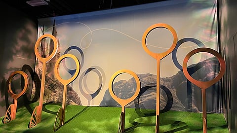 Display of authentic Harry Potter movie props - quidditch rings- at the Harry Potter: The Exhibition in Cambridge, Massachusetts.