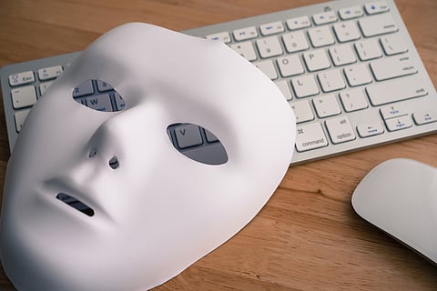 A mask over a keyboard.