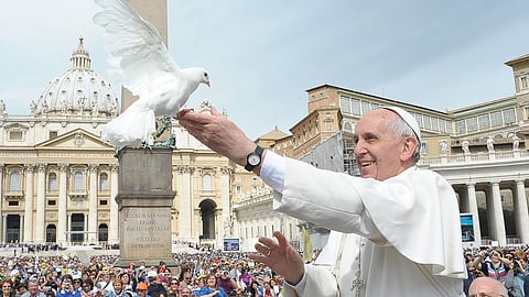 Pope Francis releases a white dove as a symbol of peace on May 15, 2013