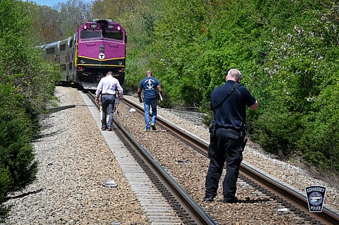 Police investigators at the accident scene.
