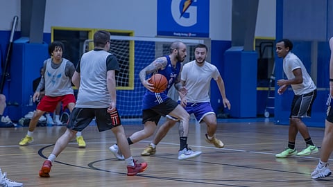 adult men playing in a basketball league at Starland in Hanover MA
