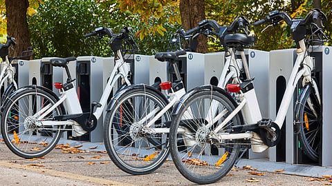 a row of e-bikes for rental