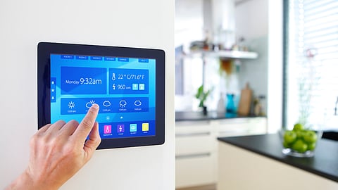 a tablet display home monitoring options in a kitchen