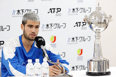 Carlos Alcaraz talks to the press after his win against Taylor Fritz in Japan Open 2025 Final