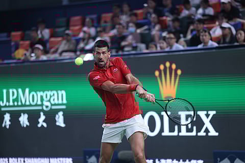 Novak Djokovic returning a shot at the Shanghai Masters