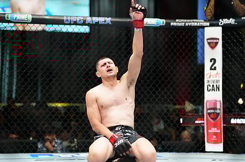 Steve Garcia celebrates after winning a UFC bout
