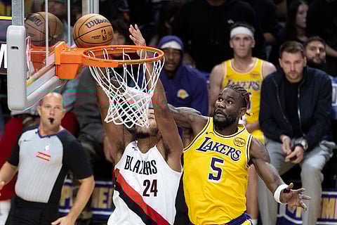 Los Angeles Lakers and Portland Trail Blazers players in action