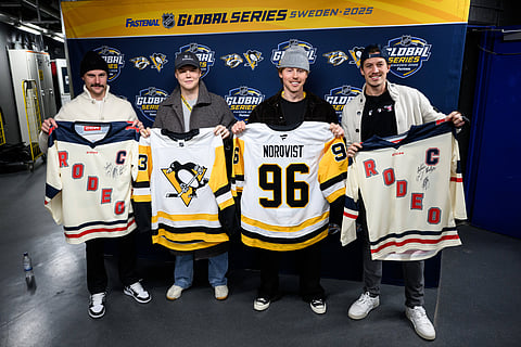 Pittsburgh Penguins' players pose with Swedish musicians