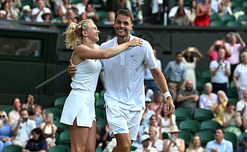Dutch Sem Verbeek celebrates with Czech Katerina Siniakova after winning the 2025 Wimbledon Mixed Doubles Finals