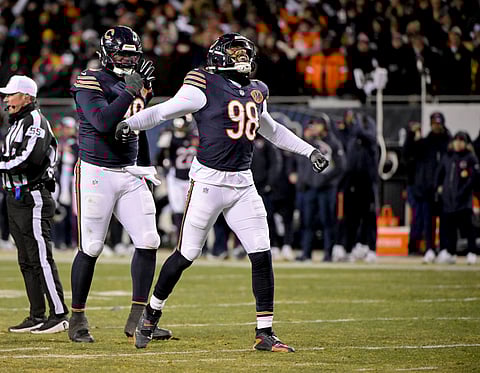 Chicago Bears defensive end Montez Sweat celebrates after sacking Green Bay Packers quarterback Malik Willis