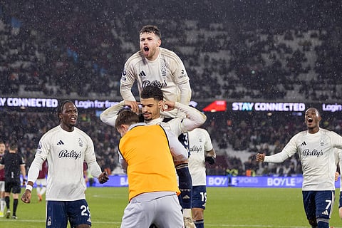 Morgan Gibbs-White celebrates his goal with teammates