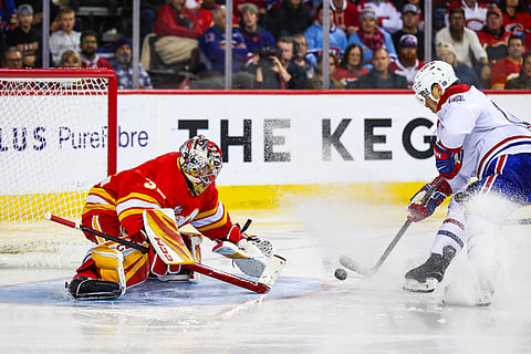Montreal Canadiens and Calgary Flames players in action