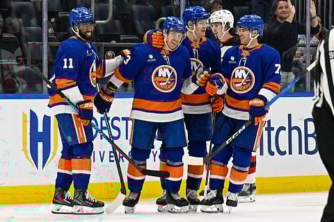 New York Islanders' players celebrate goal vs. New Jersey Devils