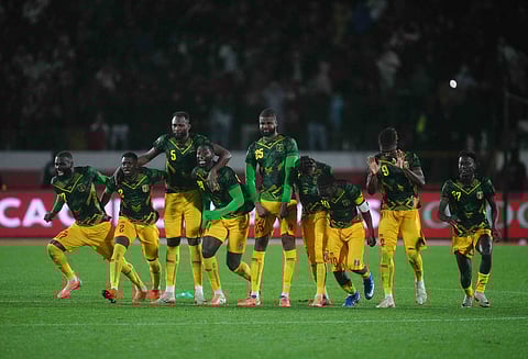 Mali celebrate their win against Tunisia