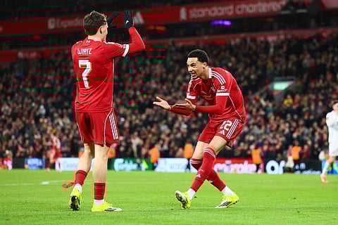 Hugo Ekitike celebrates with Florian Wirtz