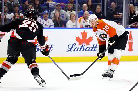 Philadelphia Flyers and Buffalo Sabres players in action