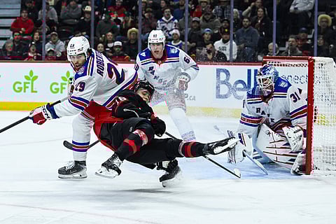 New York Rangers and Ottawa Senators players in action