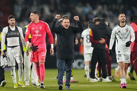 Albacete Balompie coach and players celebrate after eliminating Real Madrid