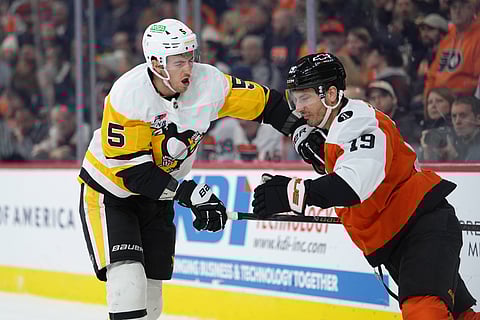 Philadelphia Flyers and Pittsburgh Penguins players in action